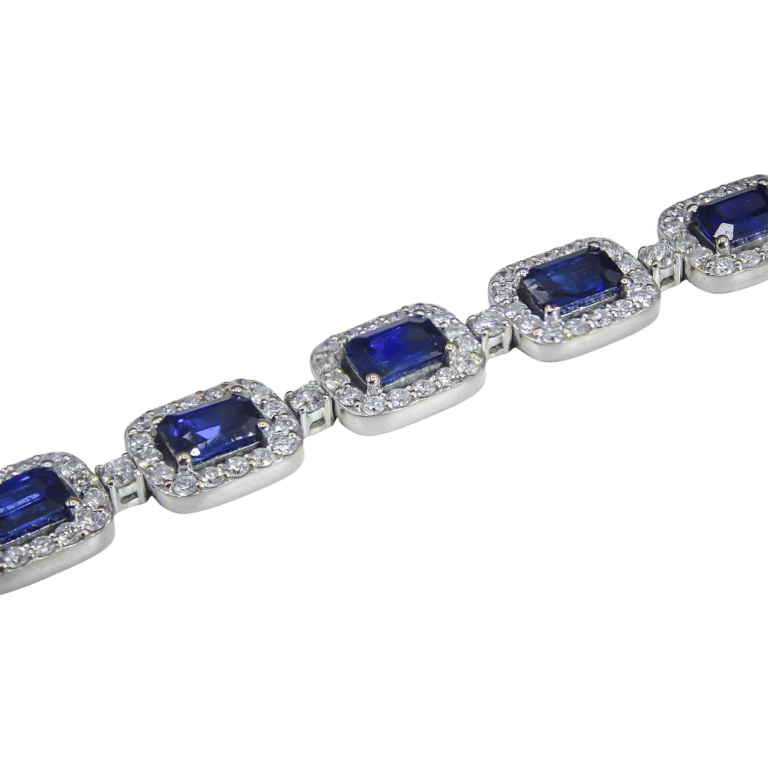 Blue Sapphire and Diamond Halo Link Bracelet in White Gold