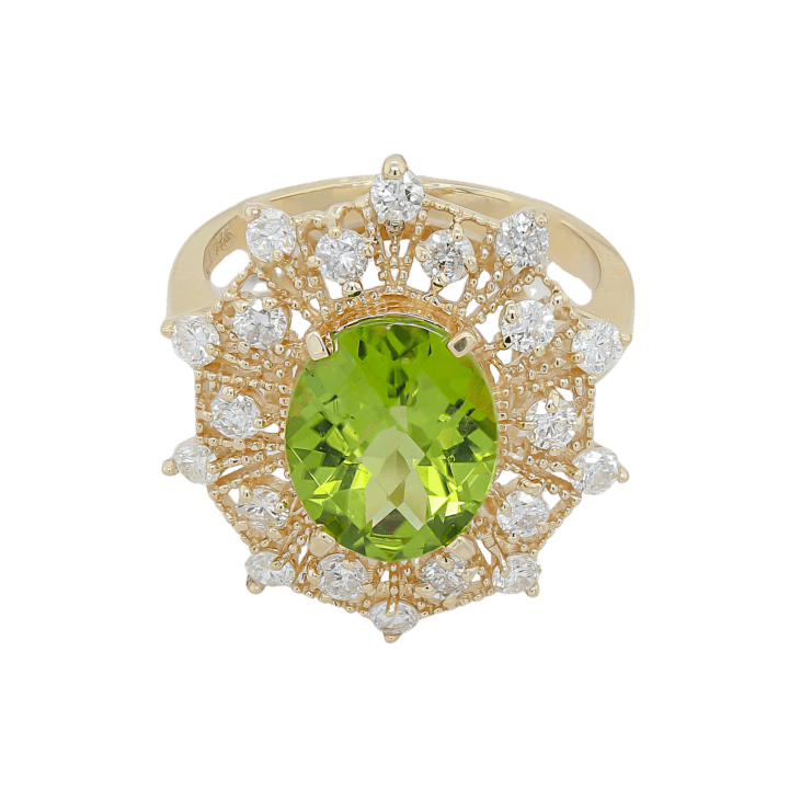 Oval peridot and diamond sunburst halo cocktail ring in 14k yellow gold