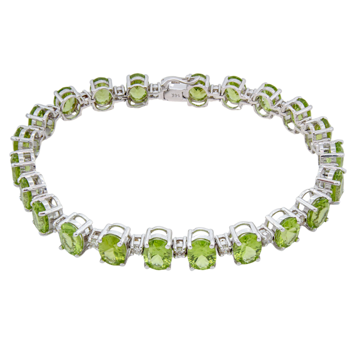14k white gold oval peridot and diamond tennis bracelet with box clasp
