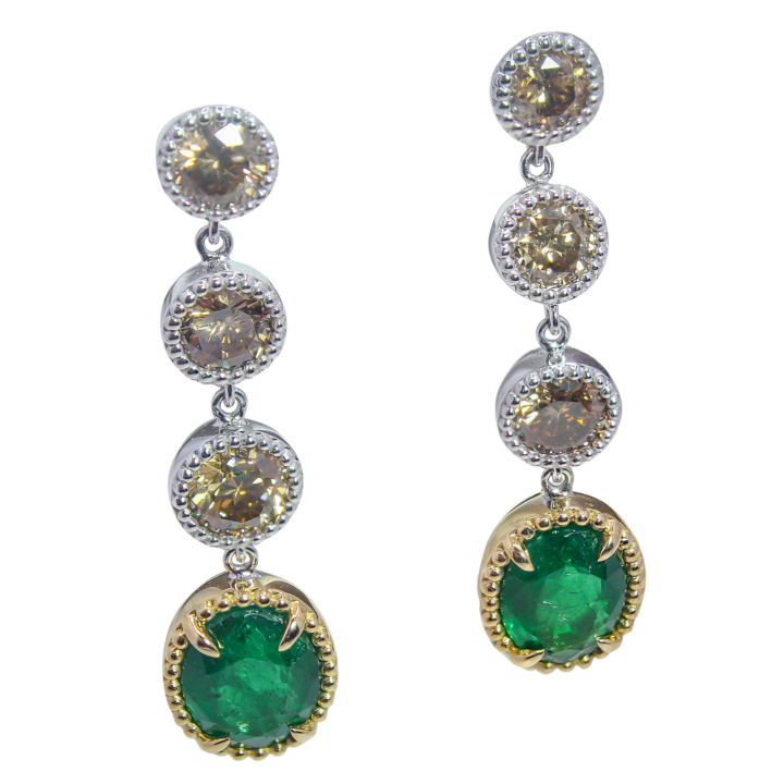 14k two-tone gold drop earrings with round emeralds and champagne diamond stations