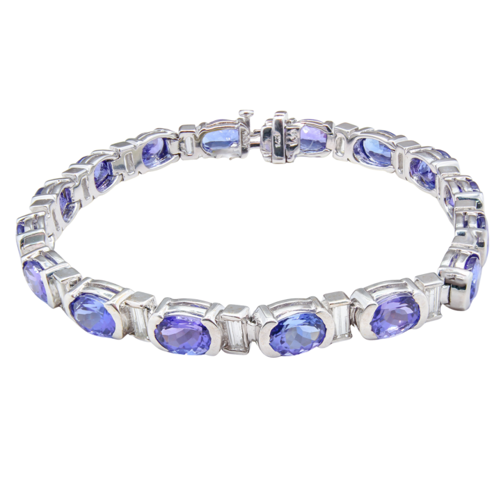 14k white gold oval tanzanite and baguette diamond tennis bracelet in excellent estate condition