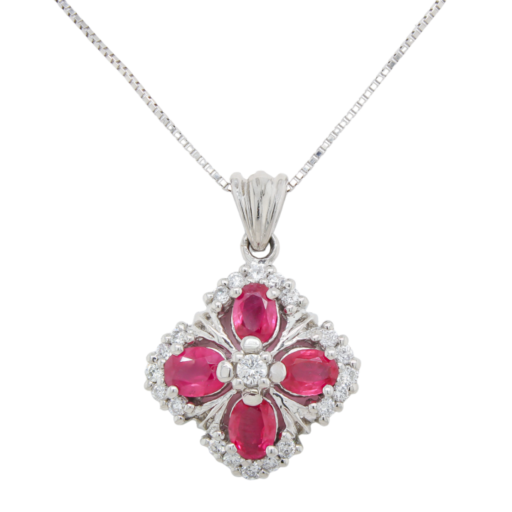 Oval ruby four-petal flower cluster pendant with diamond halo on platinum box chain.