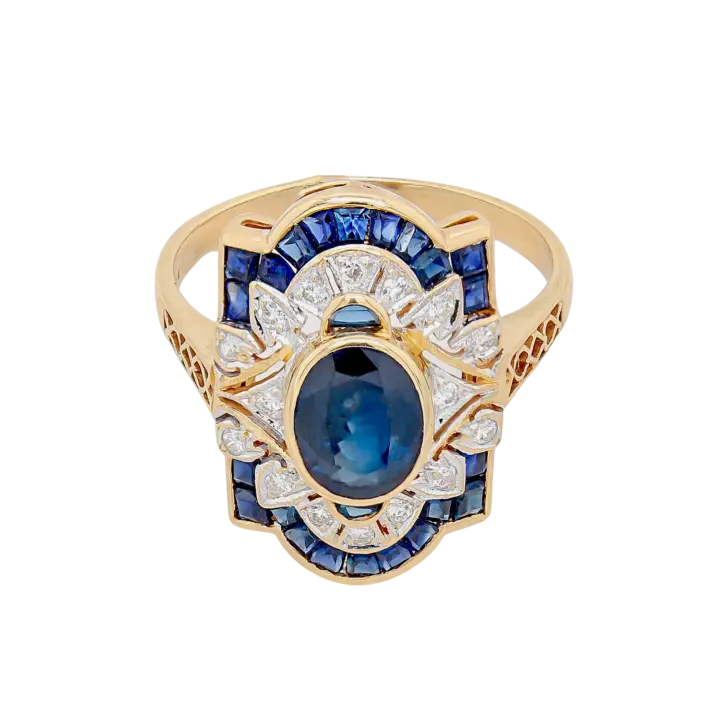 Blue sapphire Art Deco ring with calibre-cut halo and diamond accents in 18k yellow gold
