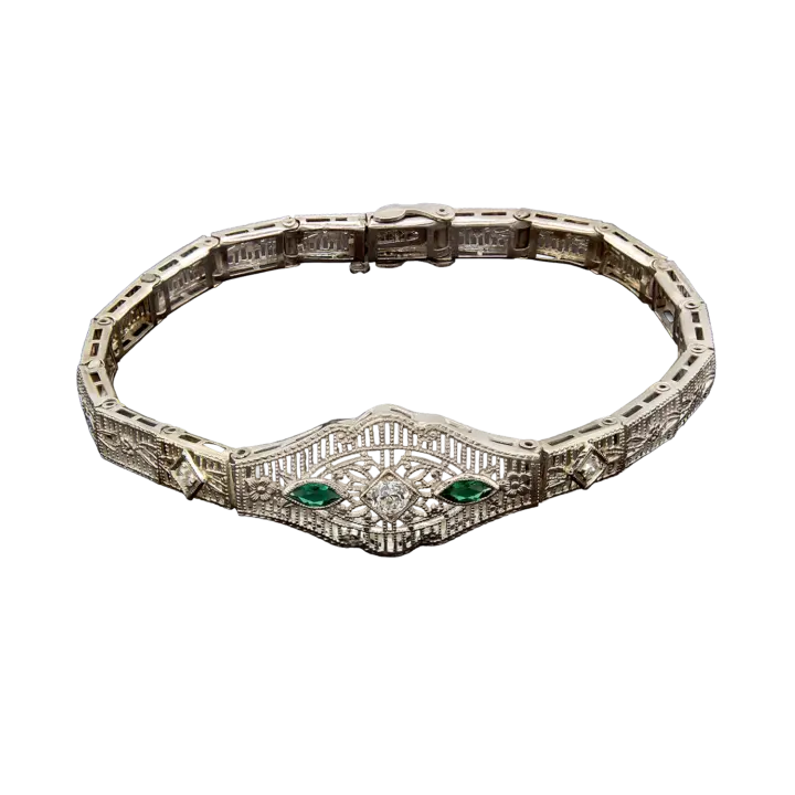 Art Deco 14K white gold filigree diamond bracelet with marquise green emeralds and millgrain links