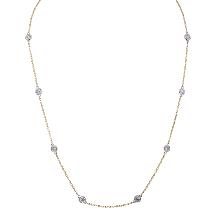 Diamond bezel station necklace in 14k two-tone yellow and white gold cable chain